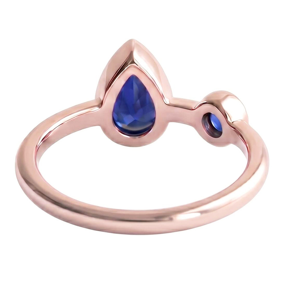 Anello Anniversario Rotondo e Pera Zaffiri Blu 2.25 Carati Oro Rosa 14K