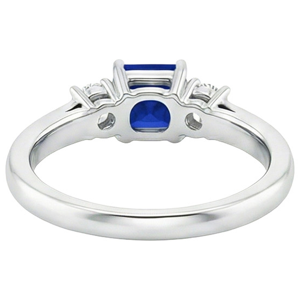 Anello Anniversary con diamante tondo e zaffiro principessa blu da 1,25 carati e oro bianco 14K