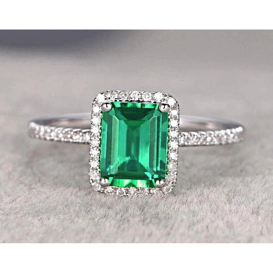 Anello di fidanzamento con smeraldo colombiano diamante Halo 3.55 carati in oro bianco - harrychadent.it
