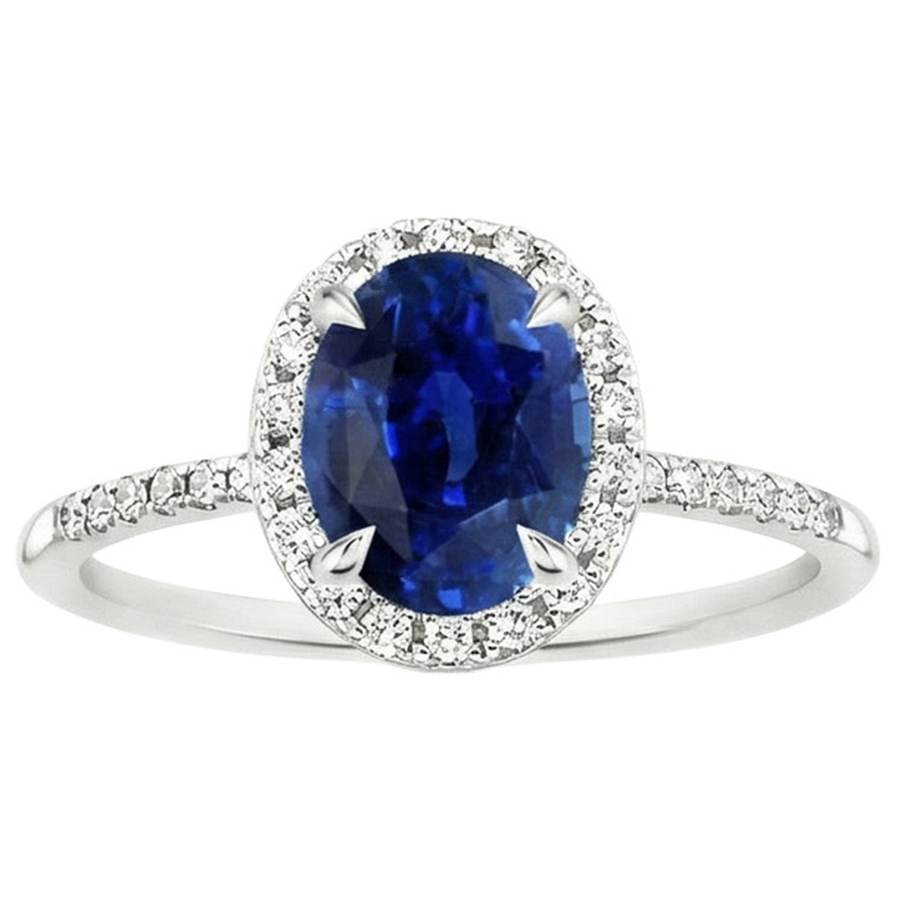 Anello Halo da donna. ovale. con zaffiro blu e accenti di diamante. 3.25 carati