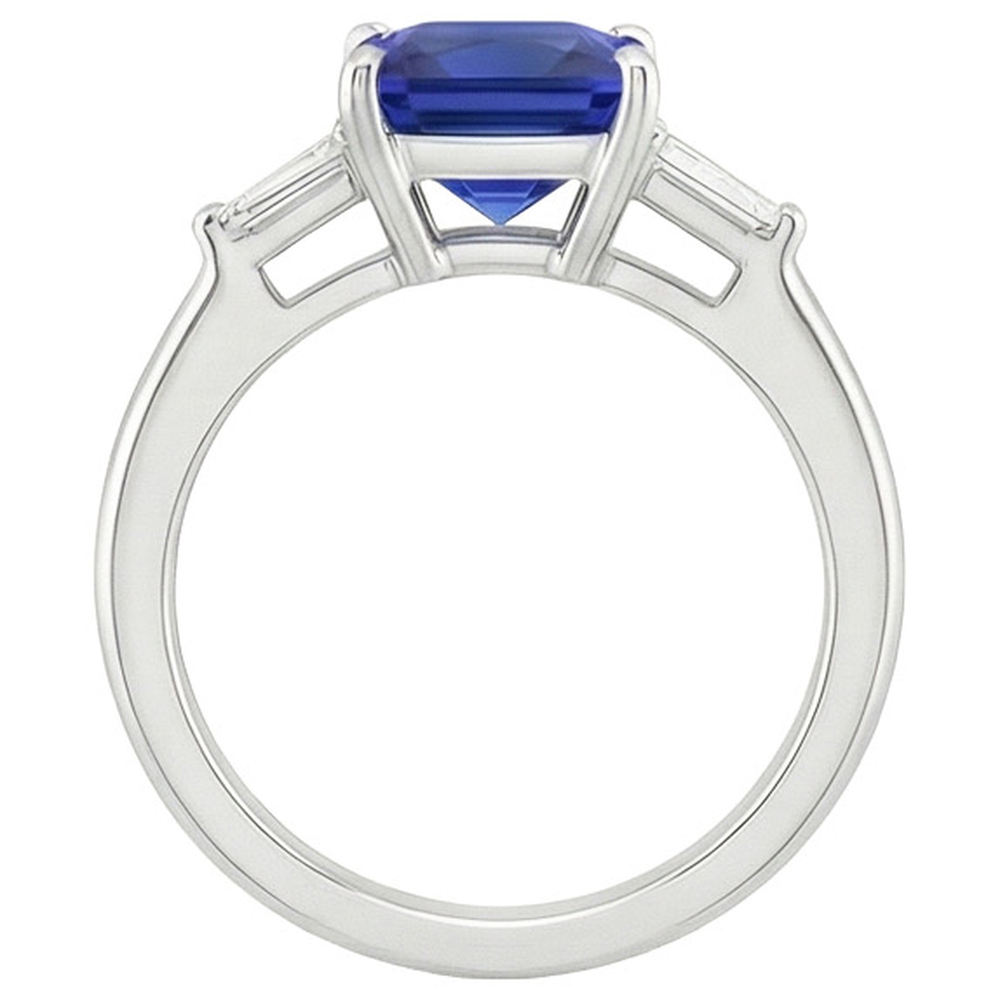 Anello con 3 pietre di diamanti. zaffiro blu principessa e baguette 5.50 carati