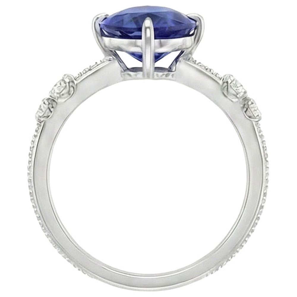 Anello con diamante. pera. zaffiro di Ceylon. 5 pietre. 2.50 carati