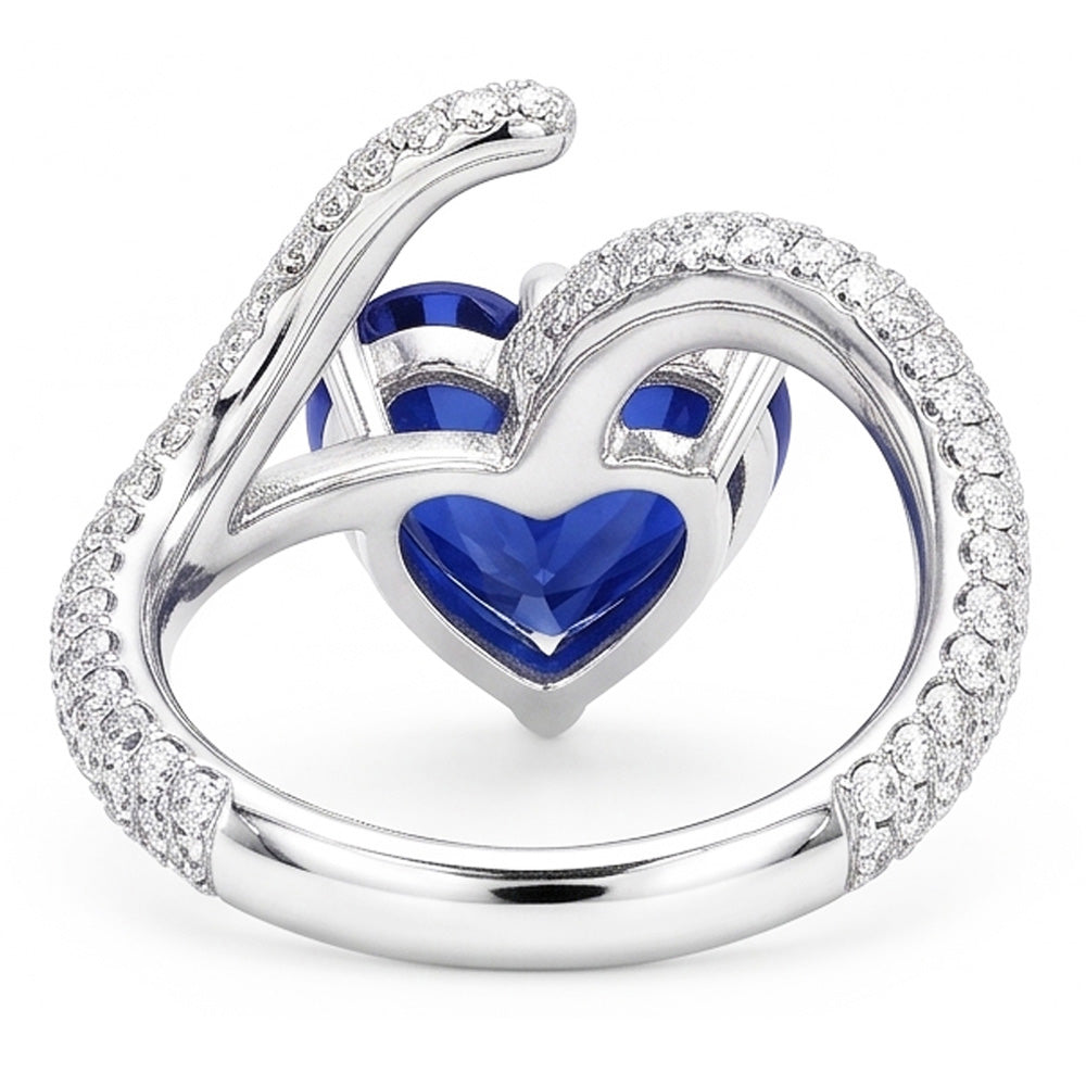 Anello con diamanti a forma di cuore con zaffiro blu. stile intrecciato. 5 carati