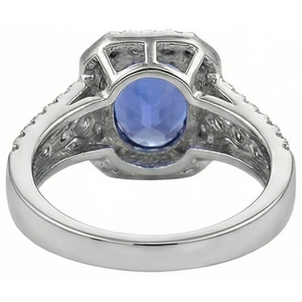 Anello con tanzanite ovale e pavé di diamanti 5.70 carati WG 14K