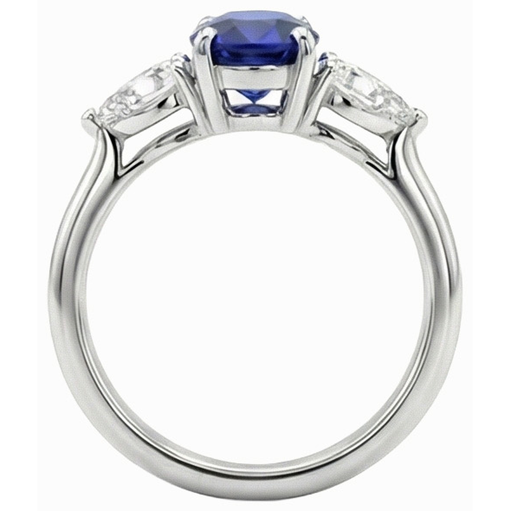 Anello con zaffiro blu profondo 3 carati e diamanti a forma di pera tre pietre ovali