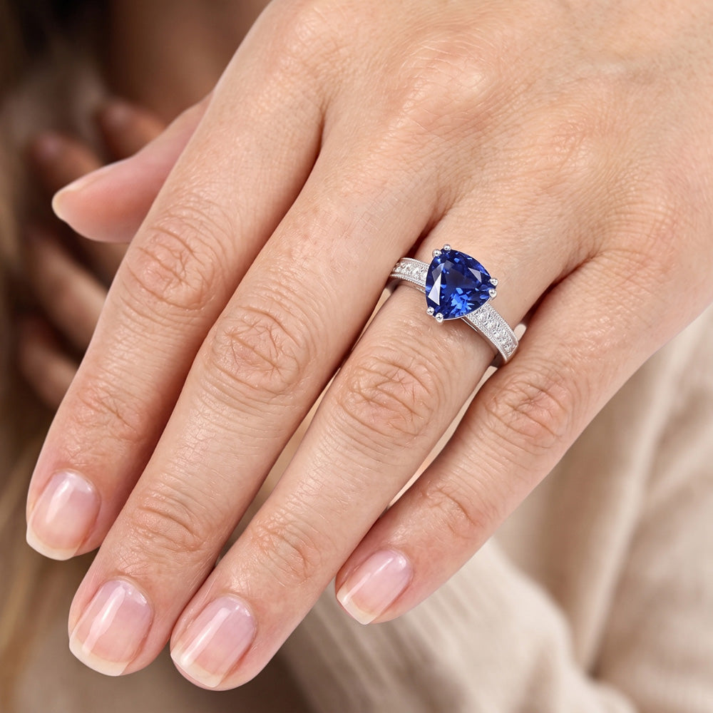 Anello con zaffiro blu taglio trilioni di gioielli con diamanti a doppia punta 2 carati