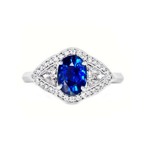 Anello in oro bianco 14 carati con zaffiro dello Sri Lanka e diamanti incastonati da 3.90 ct - harrychadent.it