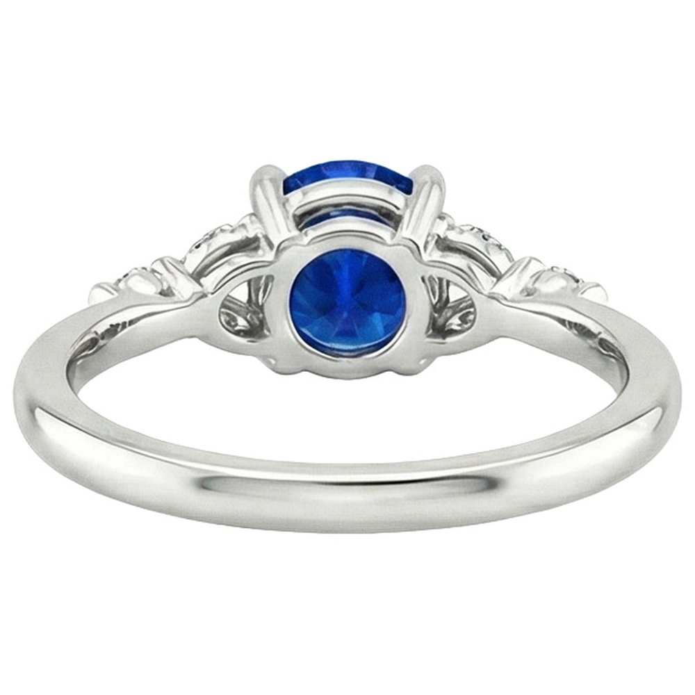 Anello da donna con pietre preziose. zaffiro blu marquise e diamanti rotondi 3 carati