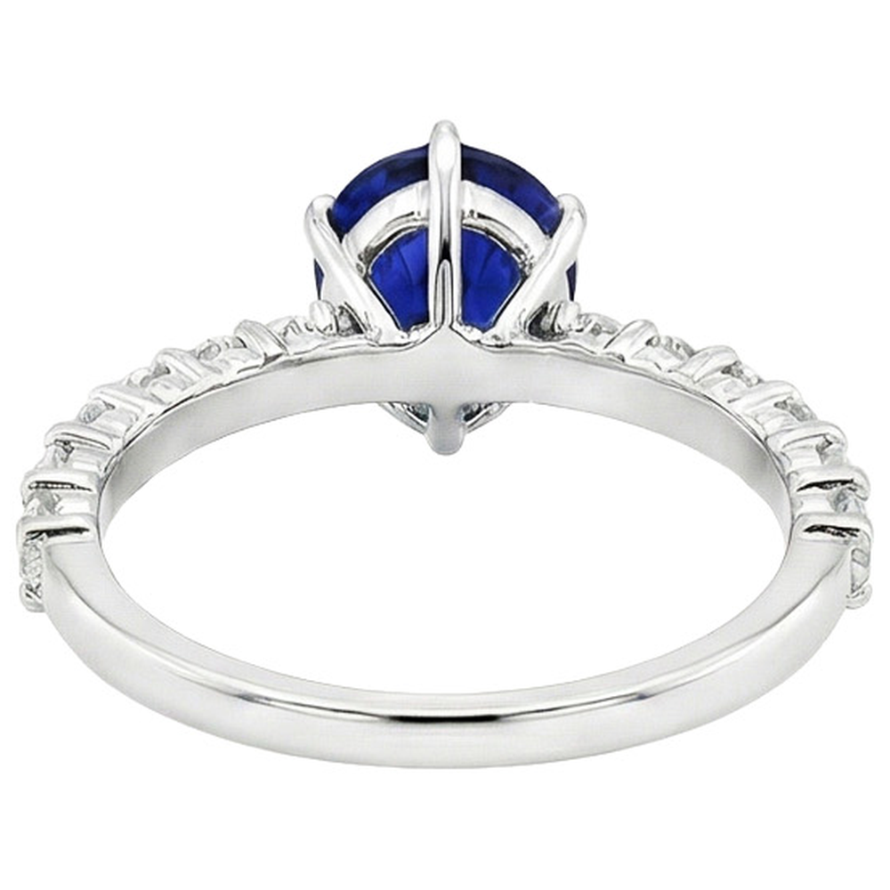 Anello da donna in oro con pietre preziose. zaffiro blu e diamanti 7.25 carati