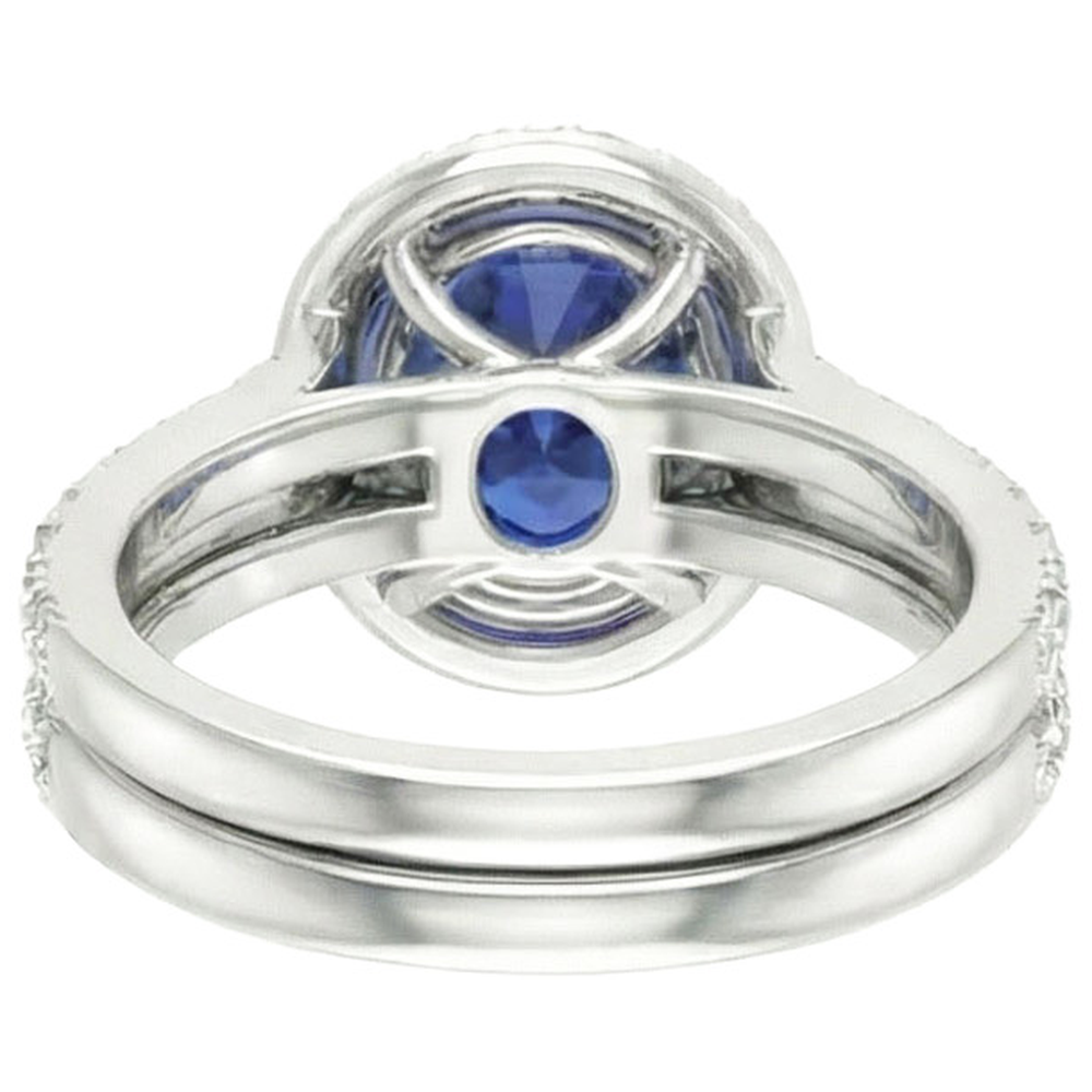 Anello di fidanzamento Halo con zaffiro blu ovale Set 10.25 carati in oro bianco