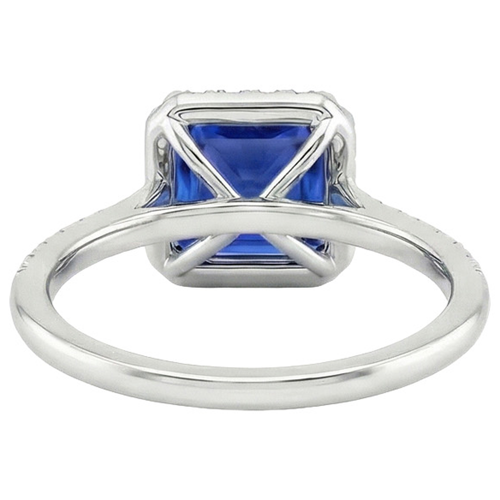 Anello di fidanzamento con diamante rotondo e zaffiro blu con accenti 6 carati