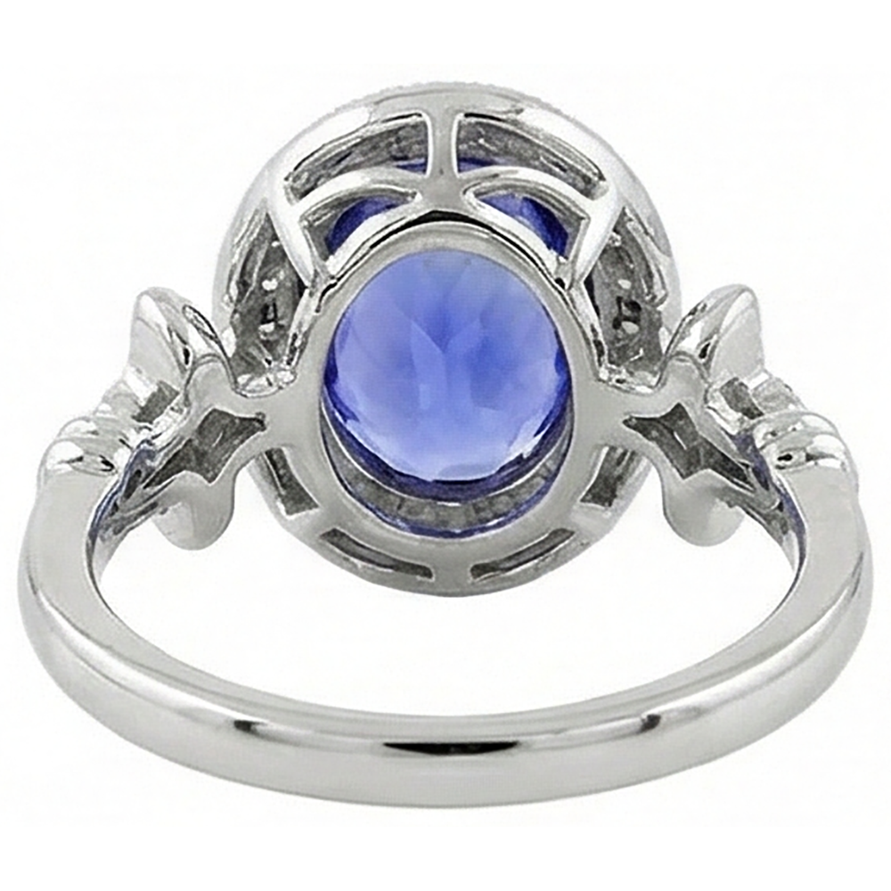 Anello fantasia in tanzanite 9 carati con piccoli diamanti in oro bianco 14K