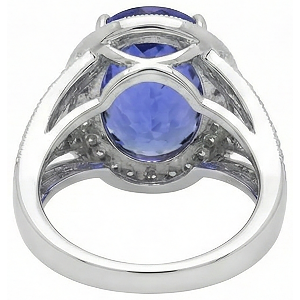 Anello fantasia tanzanite ovale centrale da 6.55 carati oro bianco 14K