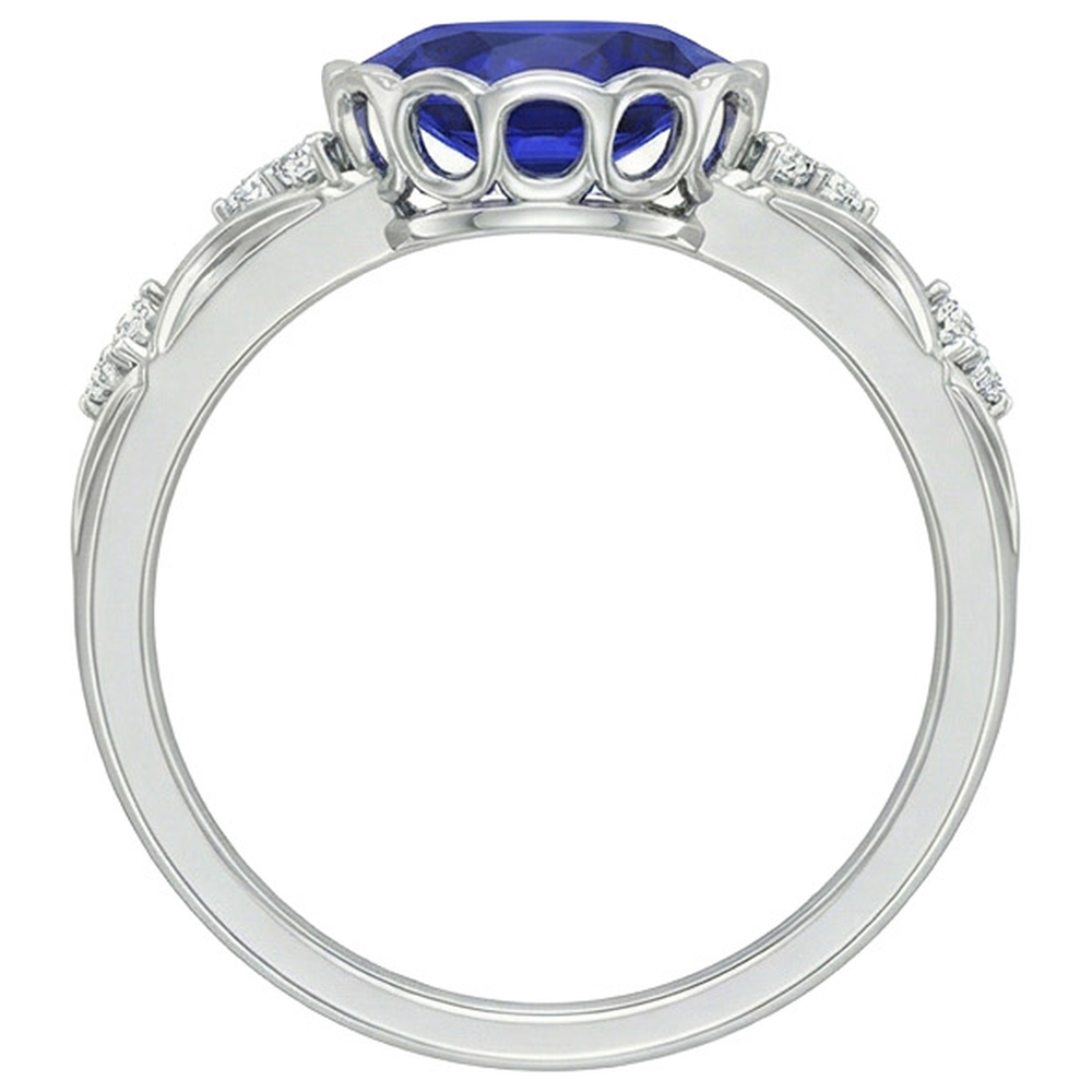 Anello in oro bianco con diamanti da donna. lunetta con zaffiro blu ovale. 3.75 carati
