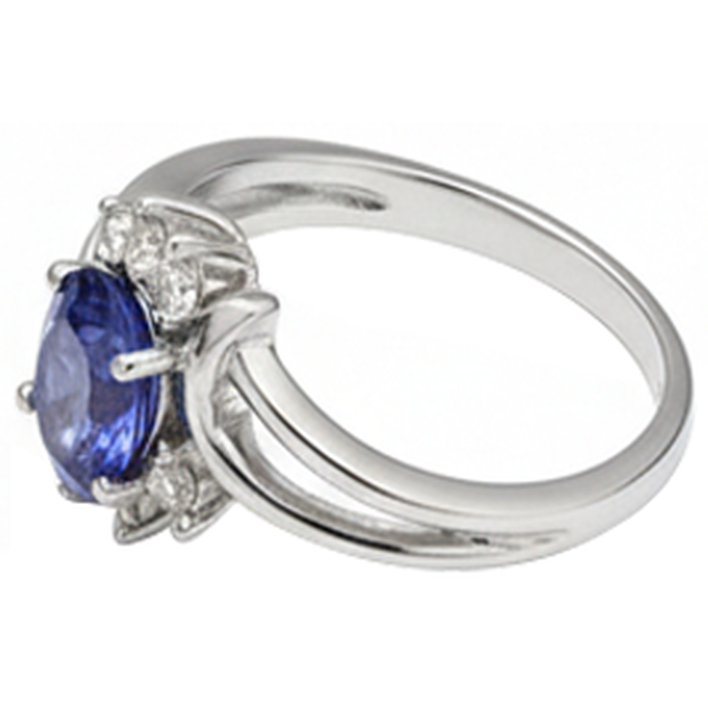 Anello in oro bianco con tanzanite ovale stile antico e diamanti 2.05 carati