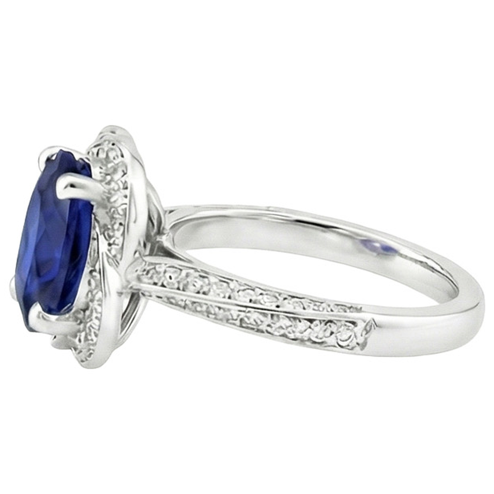 Anello in oro bianco con zaffiro di Ceylon e diamanti rotondi 6 carati