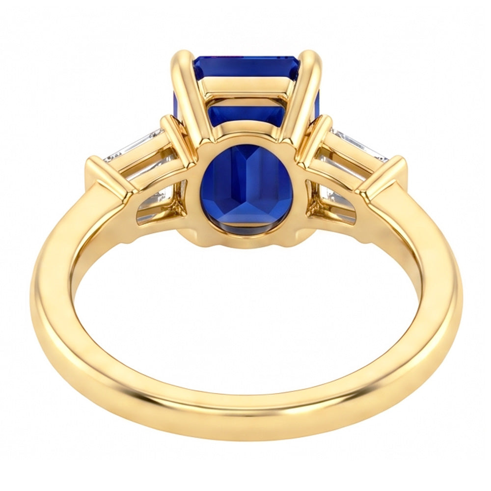 Anello in oro giallo con tre pietre e zaffiro blu smeraldo 2.50 carati