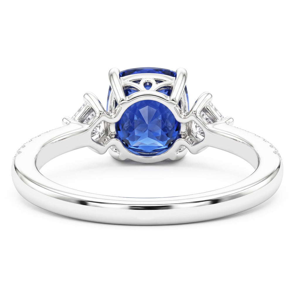 Anello in stile 3 pietre con zaffiro rotondo da 3 carati e cuscino con diamante Princess
