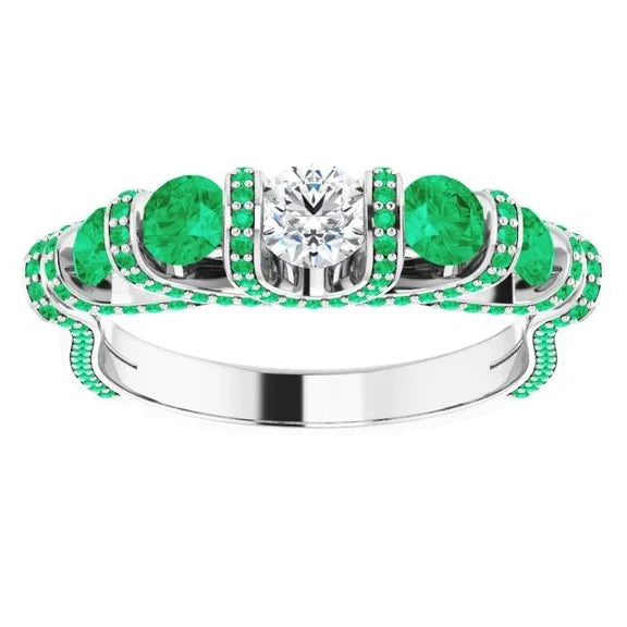 Anello in stile unico con diamante rotondo smeraldo