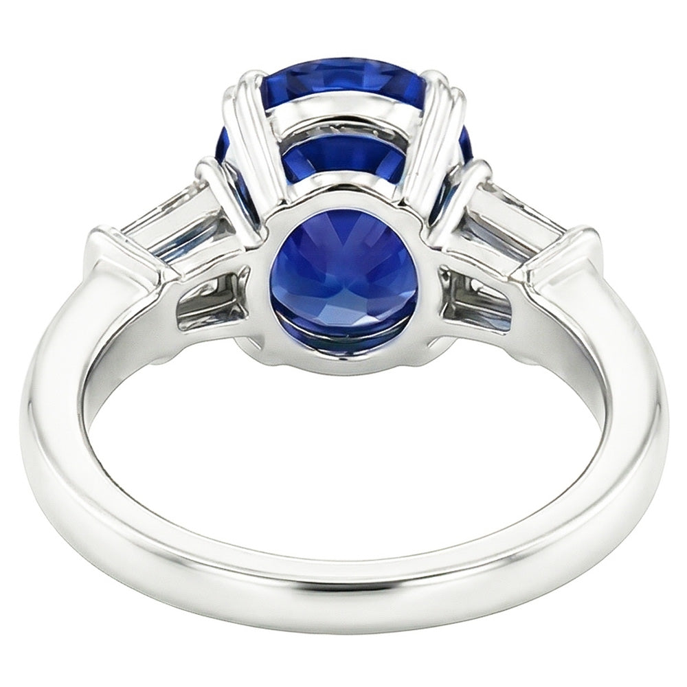 Anello ovale con tre pietre di zaffiro blu con diamante baguette 3.25 carati