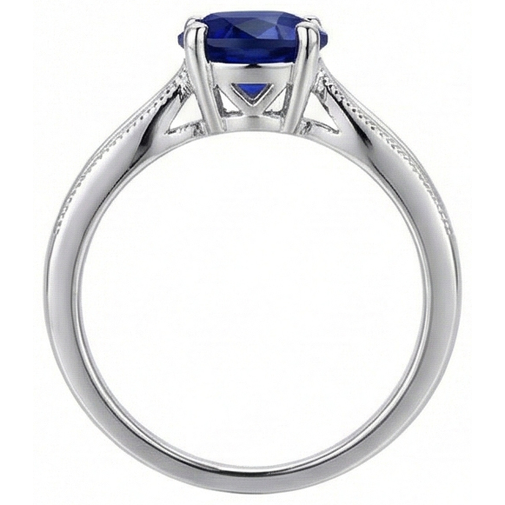 Anello solitario con gemme tonde. Zaffiro di Ceylon da 1 carati e stelo Milgrain in oro bianco 14K