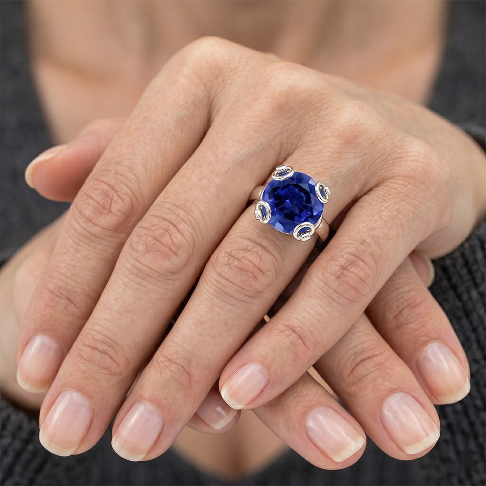 Anello solitario con zaffiro di Ceylon taglio rotondo 7 ct. Oro bianco 14K