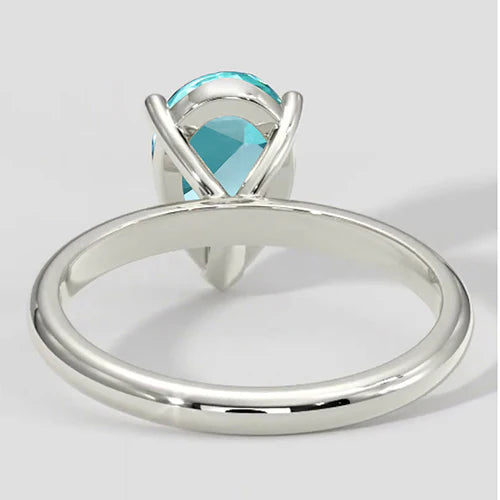 Anello Paraiba con montatura a pera e solitario