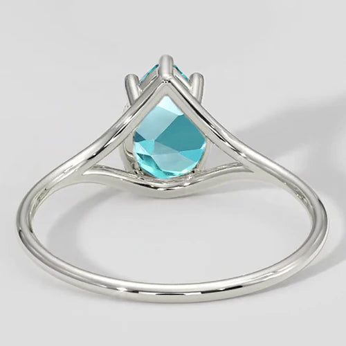 Anello con gambo diviso a pera Paraiba da 1 ct