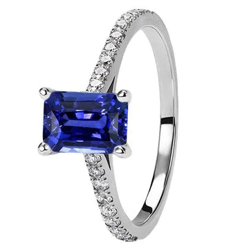 Anello da donna con zaffiro smeraldo 3 carati e pavé di diamanti in oro bianco 14k