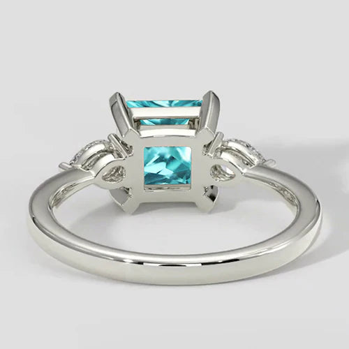 Anello di fidanzamento a cuscino con tre pietre Paraiba