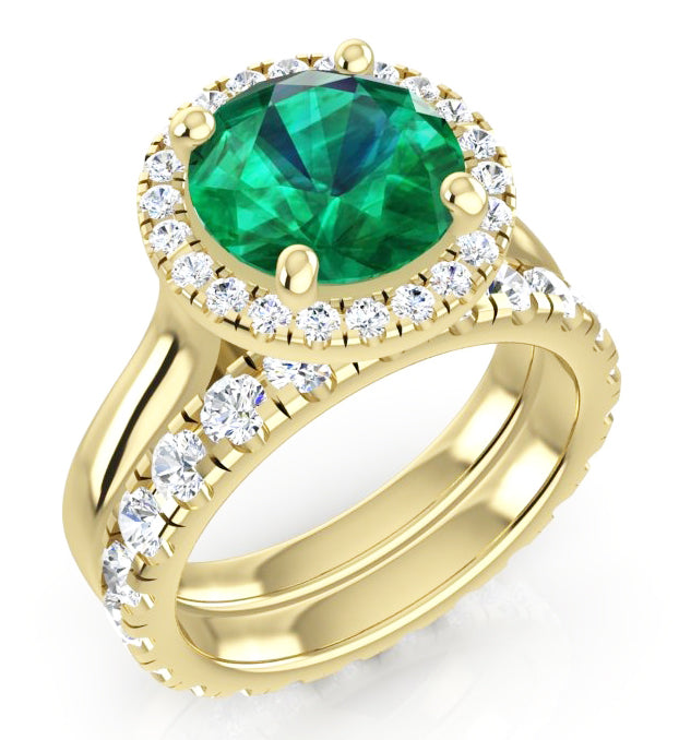 Anello in oro giallo con smeraldo verde rotondo