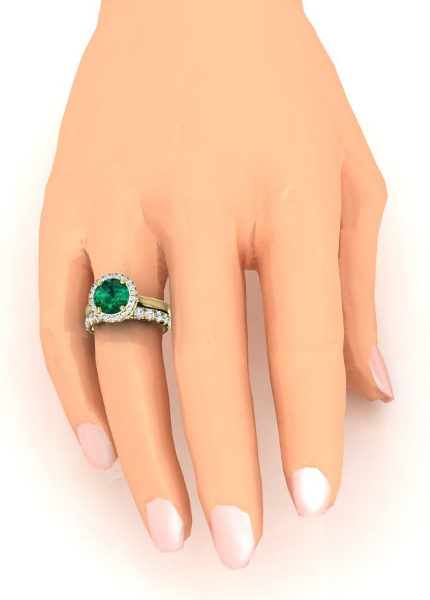 Anello in oro giallo con smeraldo verde rotondo