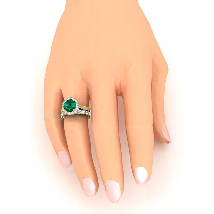Anello in oro giallo con smeraldo verde rotondo