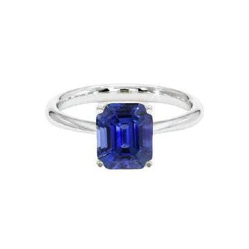 Anello solitario con 1,50 carati di zaffiro blu taglio smeraldo in oro bianco 14K