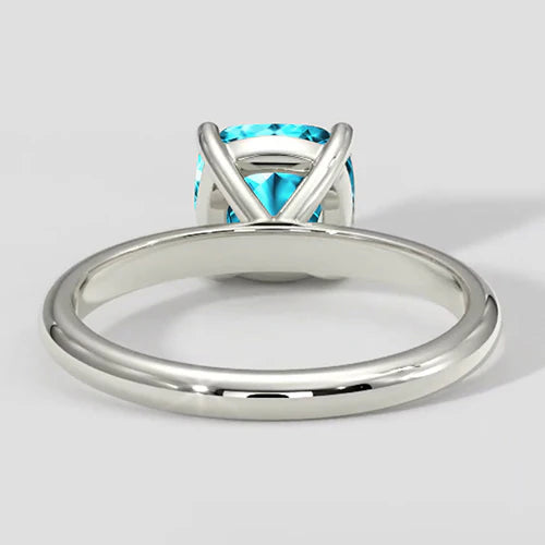 Anello taglio cuscino Paraiba bluastro naturale