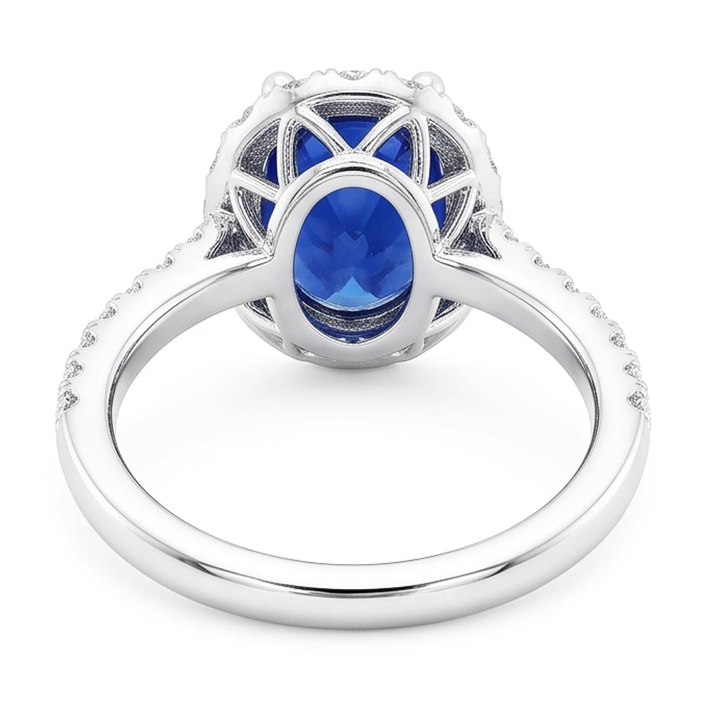 Fede Halo con 6 carati Zaffiro ovale blu intenso in oro bianco 14K