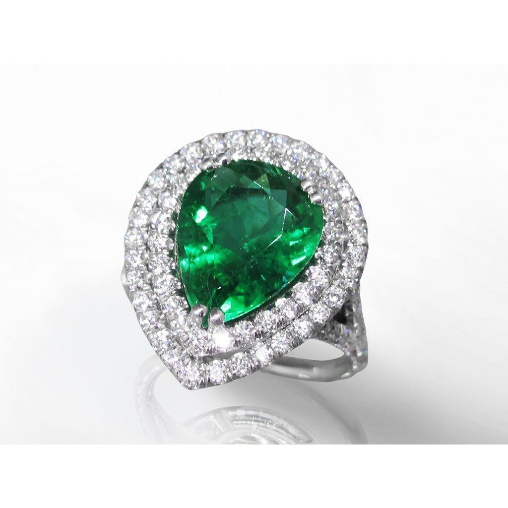 Fede nuziale con smeraldo taglio pera con alone e diamante rotondo. oro 5.50 ct - harrychadent.it