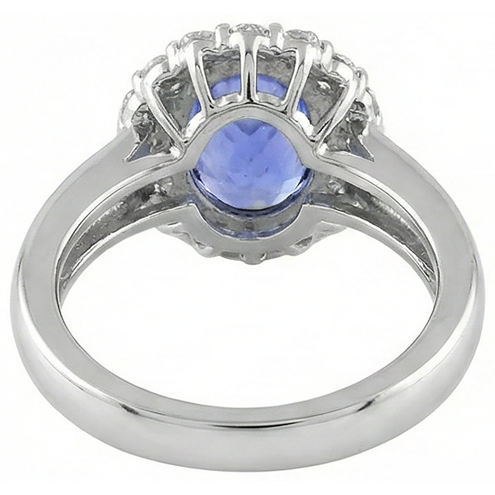 Fede nuziale in oro bianco 14 kt con tanzanite ovale da 7.50 ct con diamanti