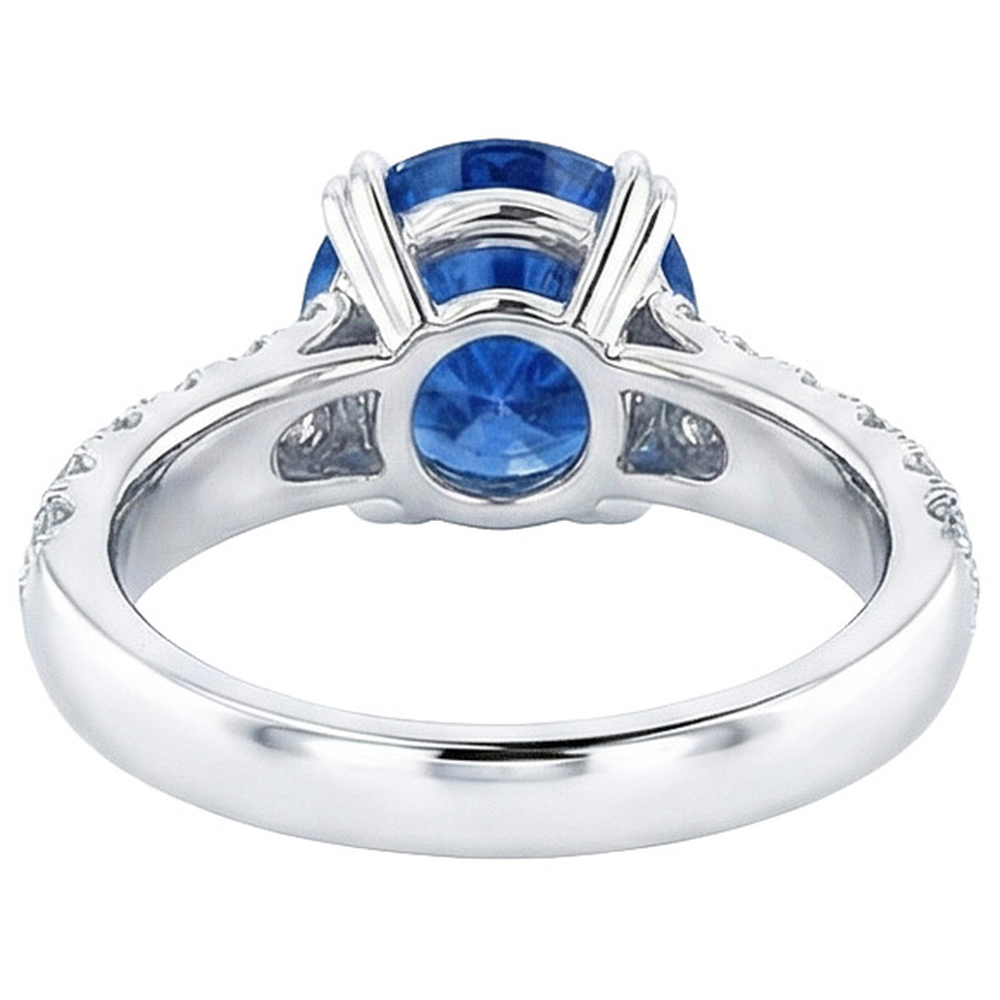 Grande anello rotondo con diamante. autentico zaffiro blu. 6 carati. con griffe in oro