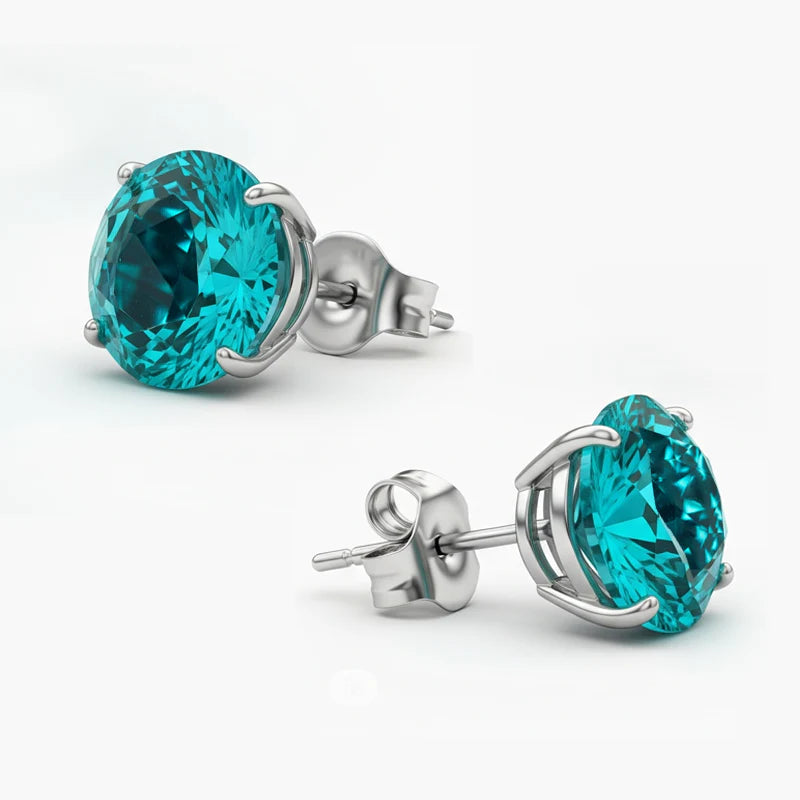 Orecchino Paraiba rotondo in oro bianco 2 carati