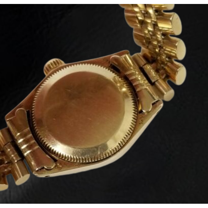 Orologio Rolex Oyster Perpetual da 24 mm con quadrante champagne e oro giallo