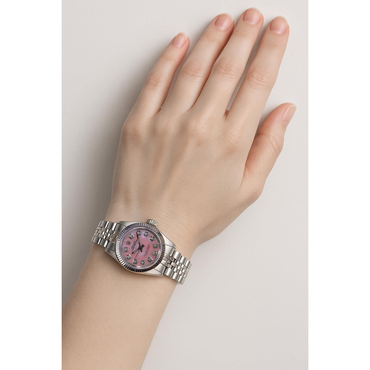 Orologio Rolex Oyster Perpetual in acciaio inossidabile con lunetta scanalata e quadrante con diamanti