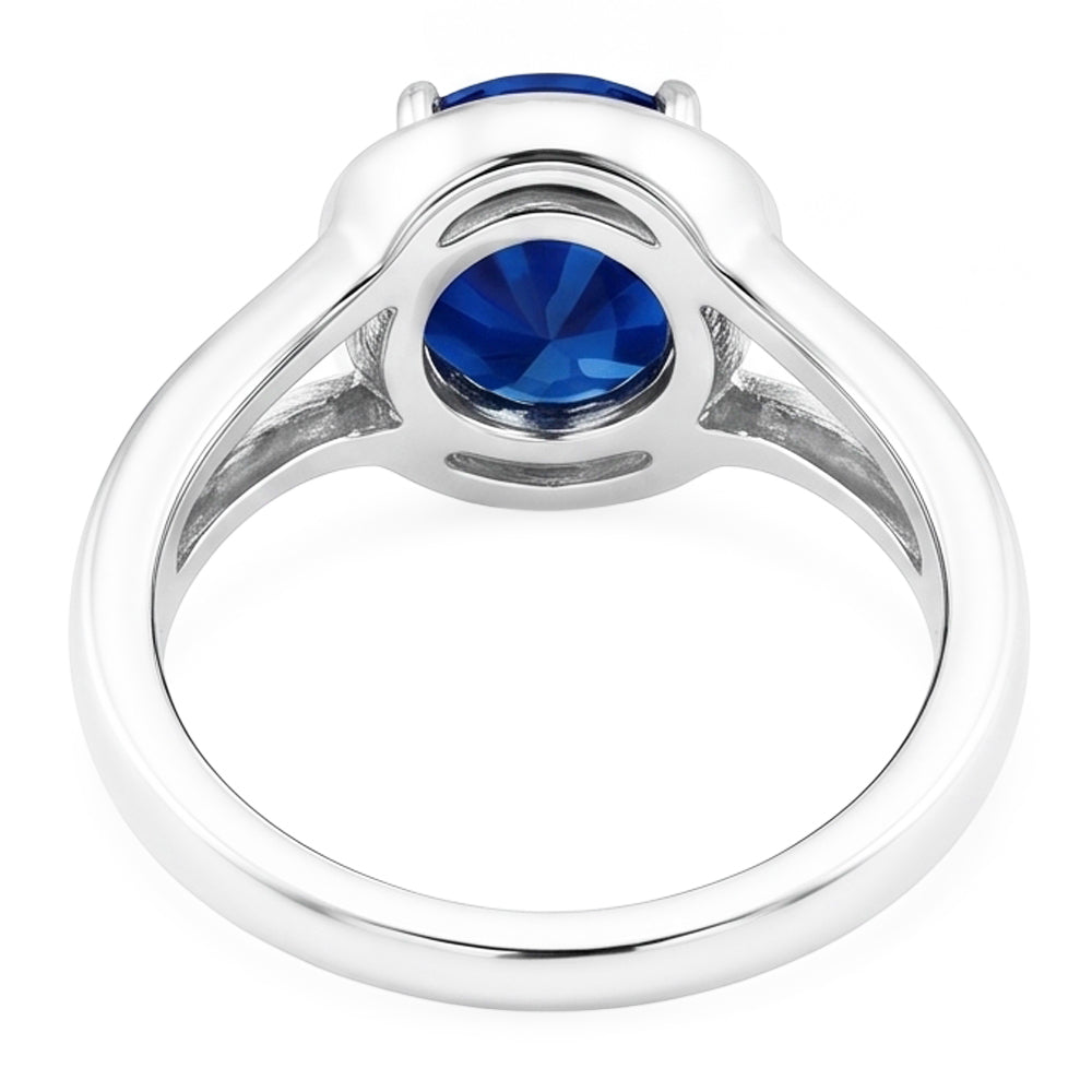Solitario rotondo con zaffiro blu anello con gambo diviso in oro 2 carati