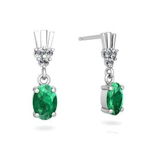 Verde Smeraldo ovale e diamanti 6.30 ct. Orecchini pendenti in oro bianco 14 carati