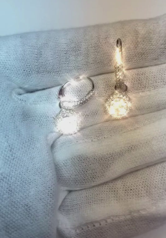 Orecchini pendenti da donna con diamanti. taglio rotondo. 2.90 carati. oro bianco 14K