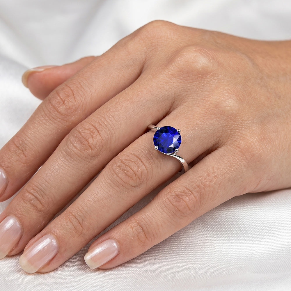 solitario Anello con stelo tondo di tensione in zaffiro blu da 2,50 carati in oro bianco 14K