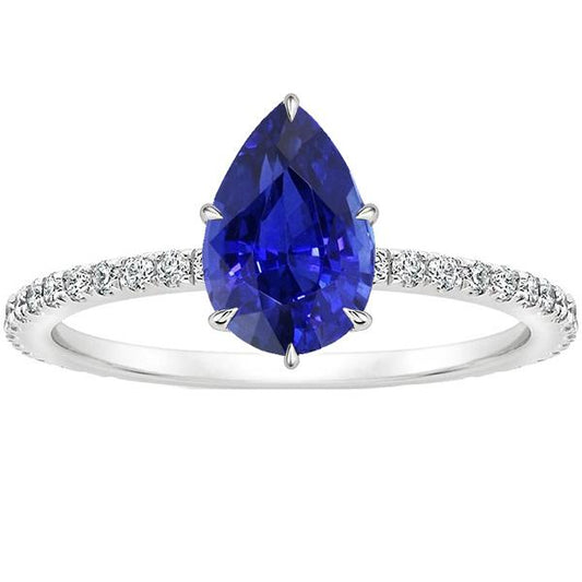 Anello solitario con zaffiro blu taglio a pera e pavé di diamanti 4.50 carati - harrychadent.it