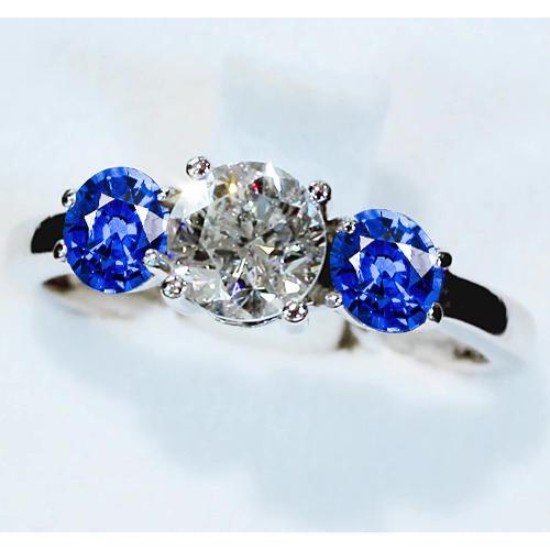 Anello con 3 pietre. diamante e zaffiro blu. 3.50 carati. incastonato a cattedrale - harrychadent.it