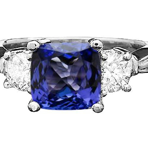 Anello con cuscino in tanzanite da 4.51 carati e diamanti rotondi Oro bianco 14K - harrychadent.it