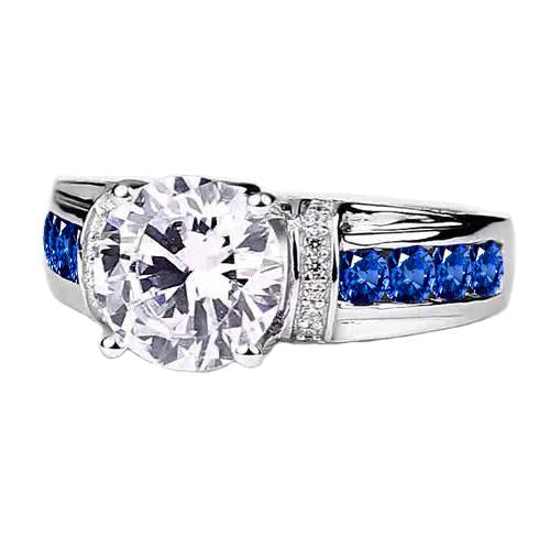 Anello con pietre di zaffiro blu accentate con un diamante tondo da 3 carati e oro bianco 14 carati - harrychadent.it